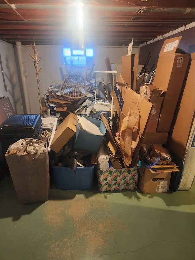 Roll-off dumpster container at job site for 4 Yard Dumpster Rental in Upton